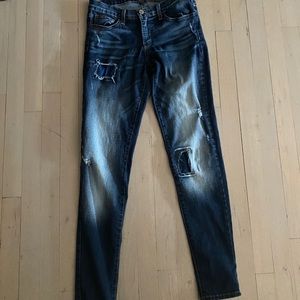 Ripped blue jeans